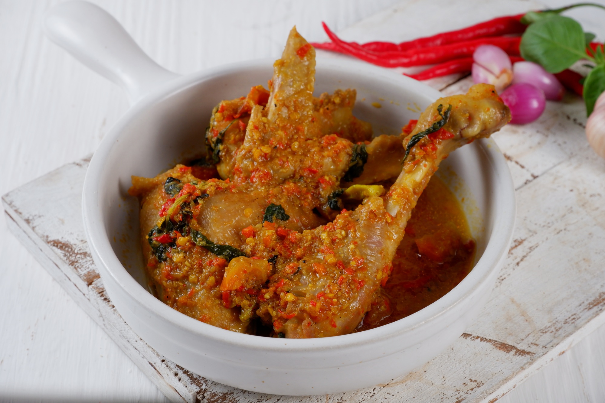kuliner khas manado Indonesian traditional foodAyam woku is a typical dish of Manado North Sulawesi The chicken is co