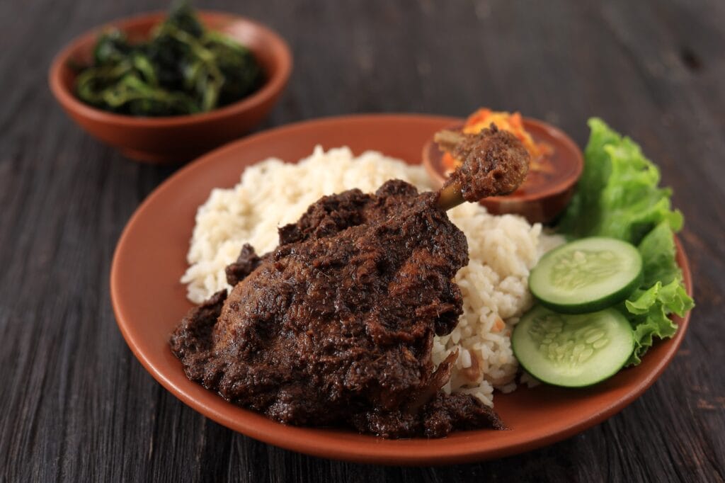 Maduranese duck with black spicy sauce jajandikitid resep bebek madura